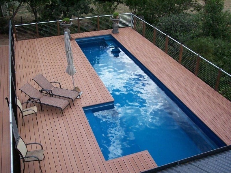 Compass fibreglass pool installed within an elevated deck