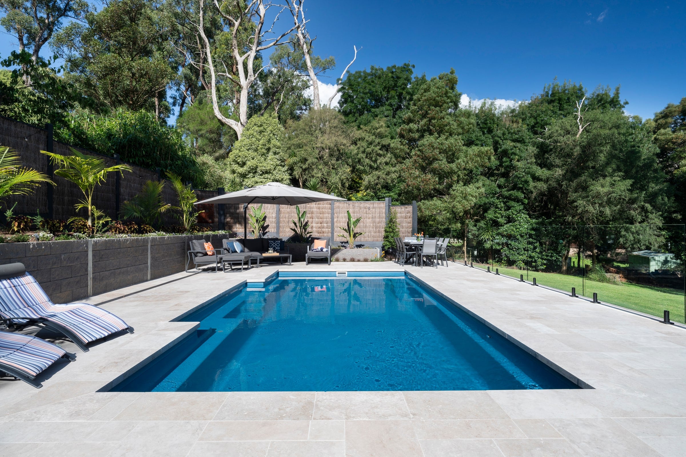 Formal view along the fibreglass pool in Emerald