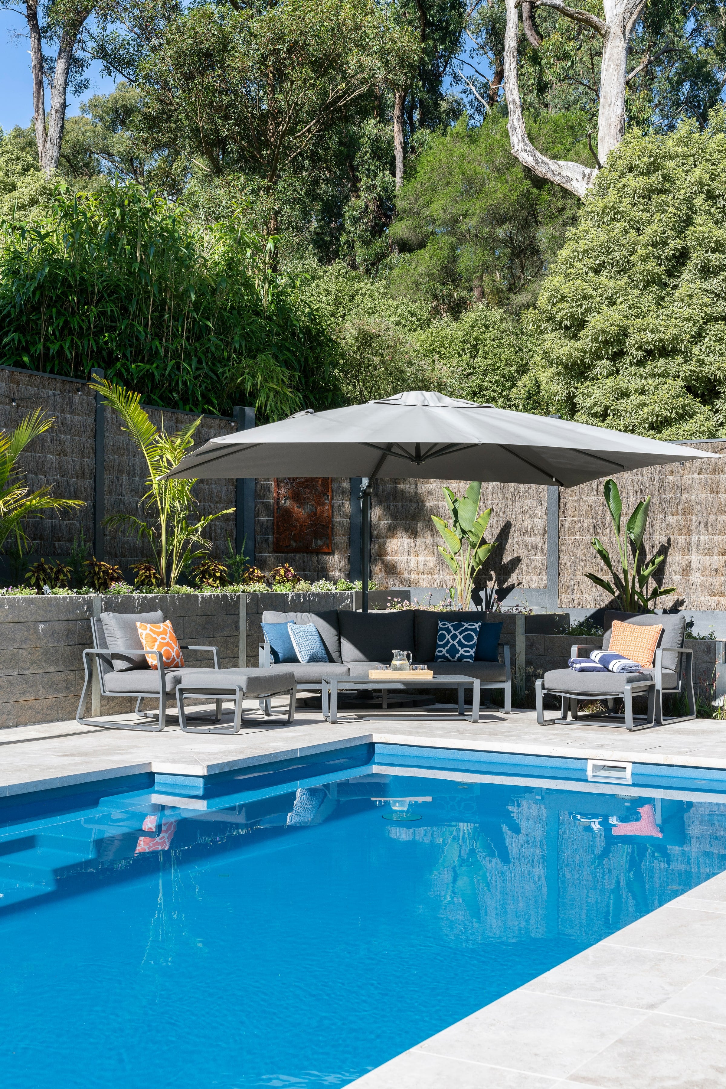 Poolside entertaining area and retaining walls in Emerald