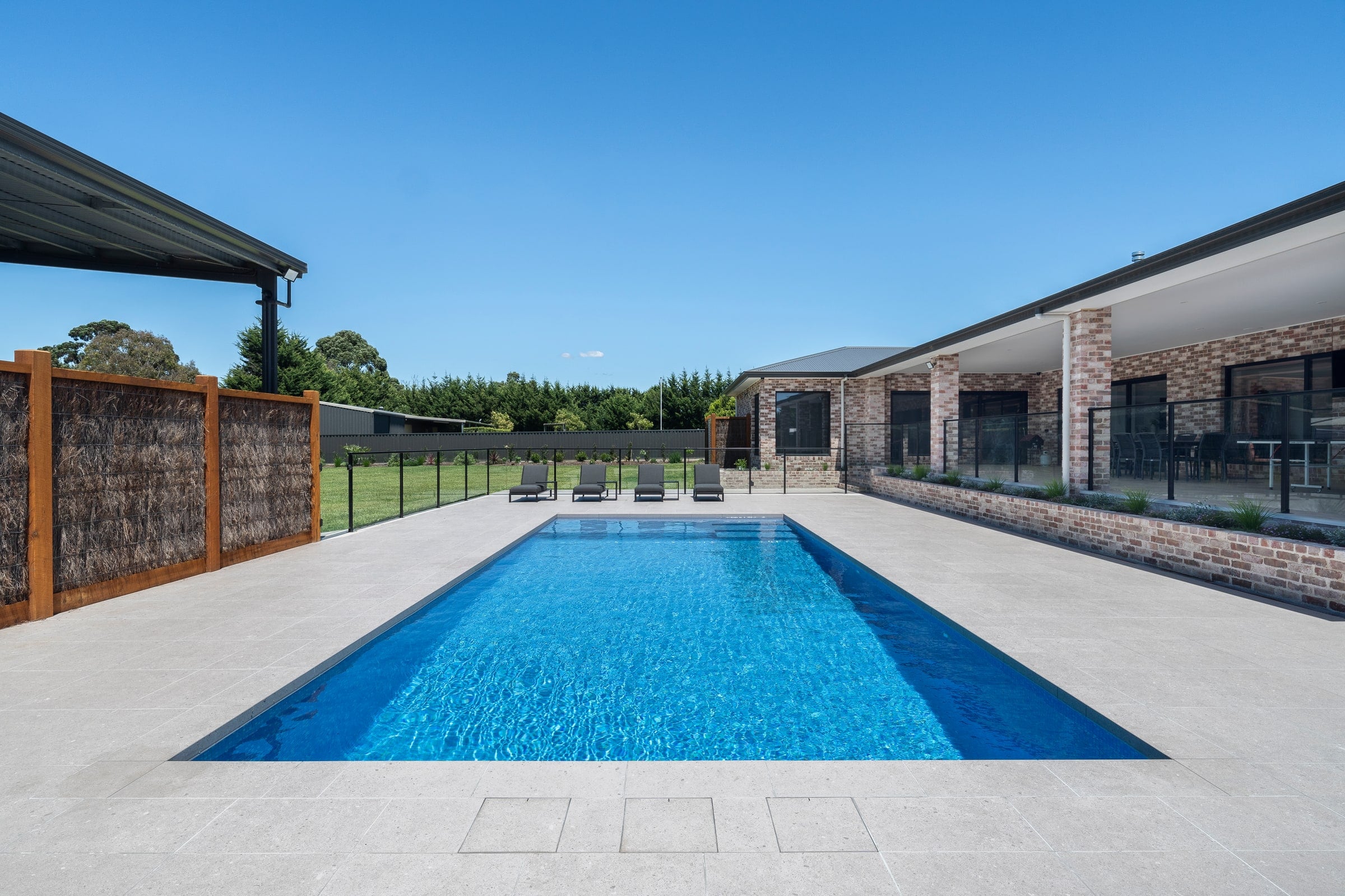 Long view along the tiled concrete pool in Cranbourne