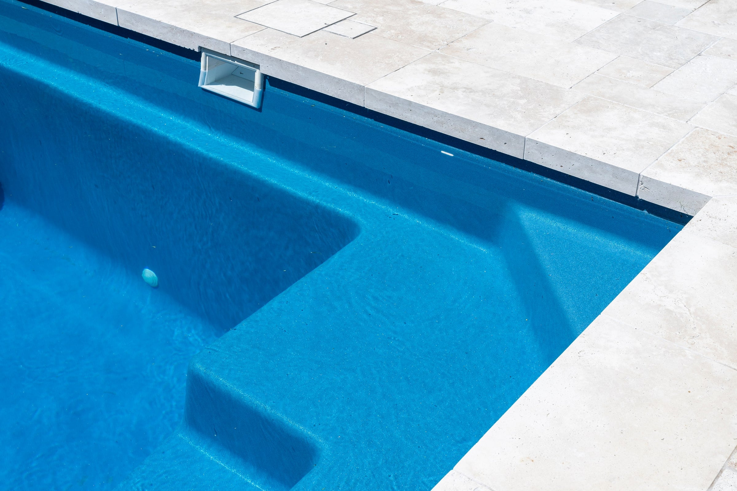 Pool corner, entry steps and stone coping in Carnegie