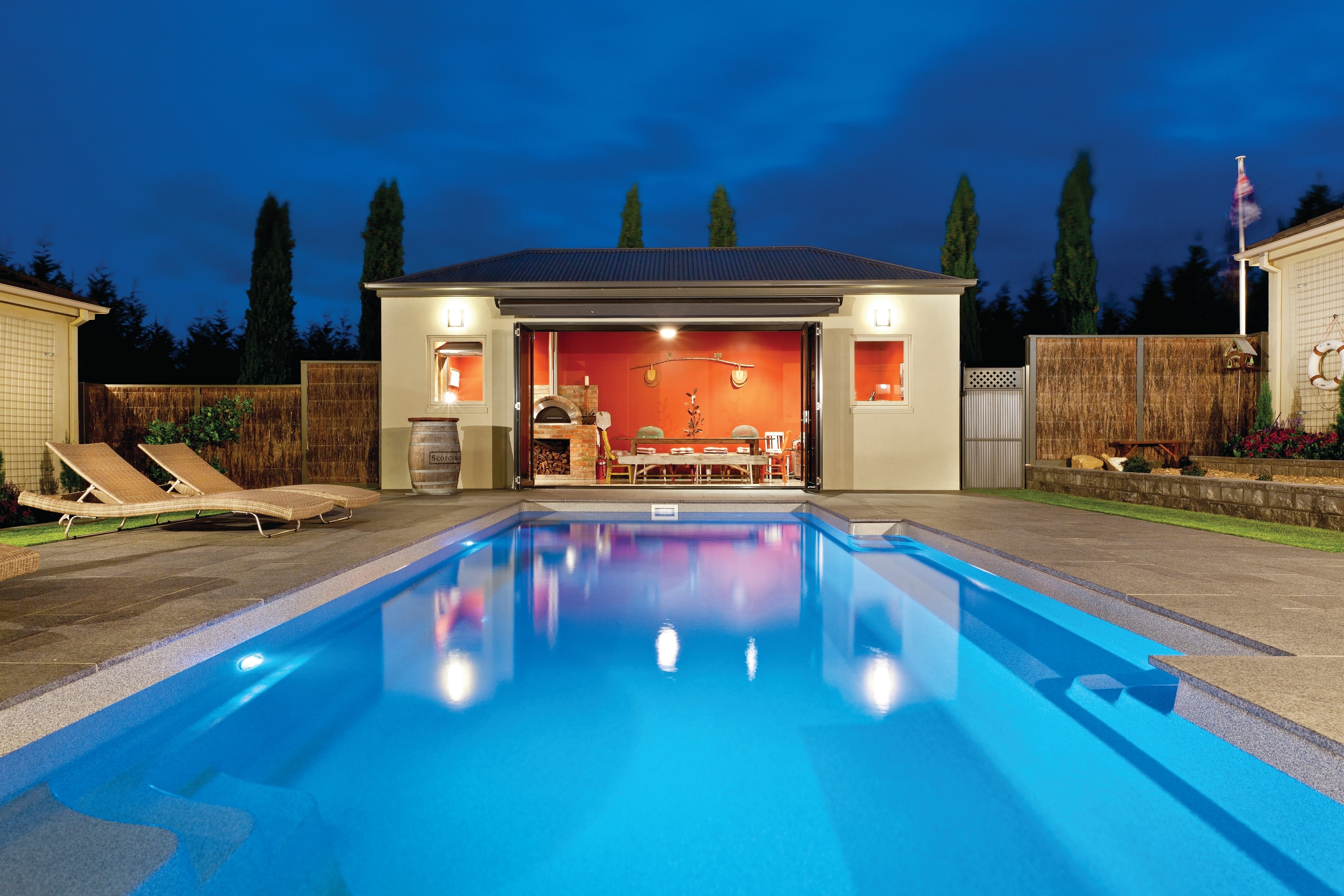 Vogue pool and pavilion illuminated in the evening