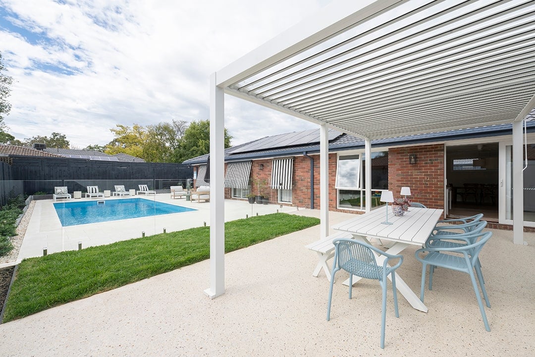 Pergola, outdoor dining and the pool beyond in Rowville