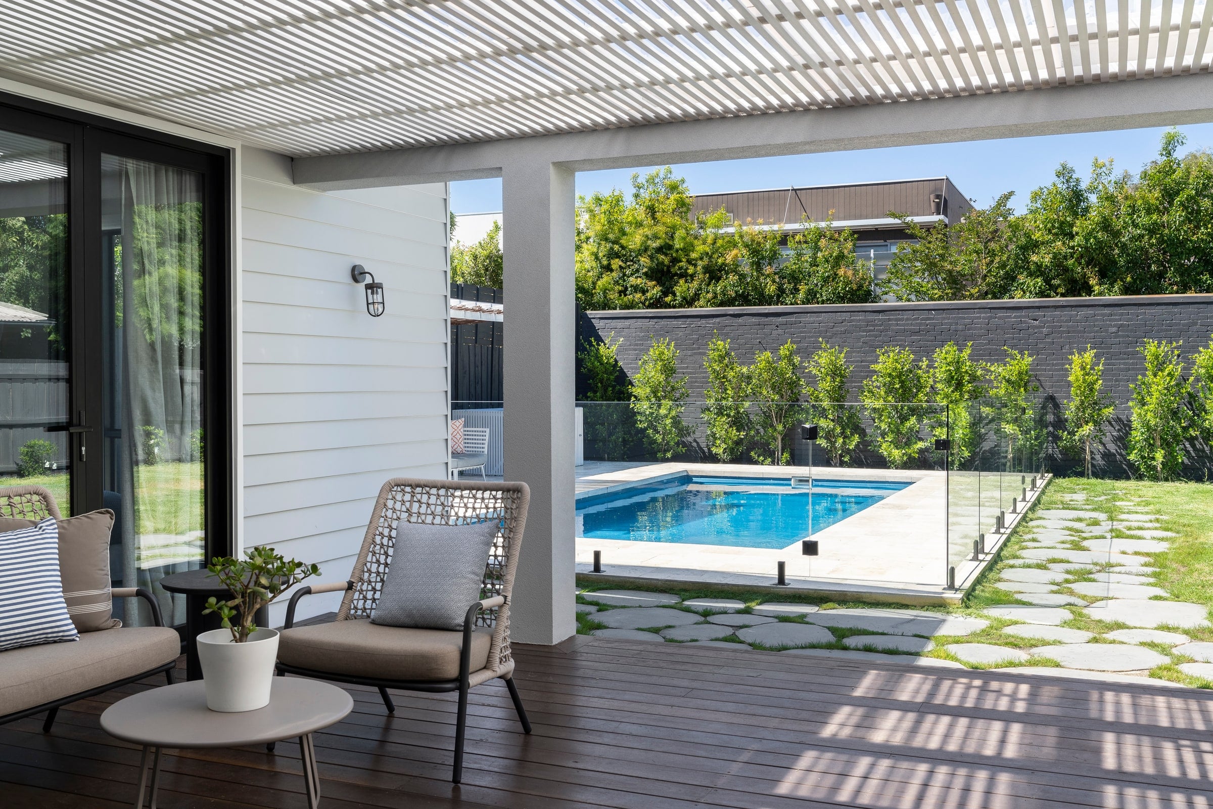 Covered deck looking out over the pool in Carnegie
